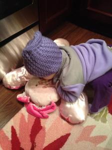 Ella received a package yesterday and immediately started kissing the stuffed animal.
