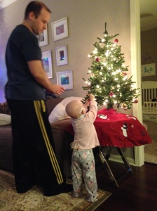 Helping dad decorate.